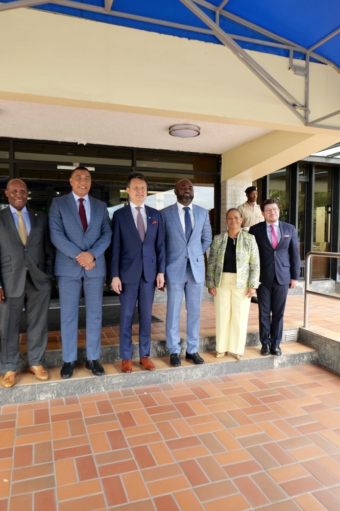Jamaican officials and the WIPO delegation gather for an official group photograph.