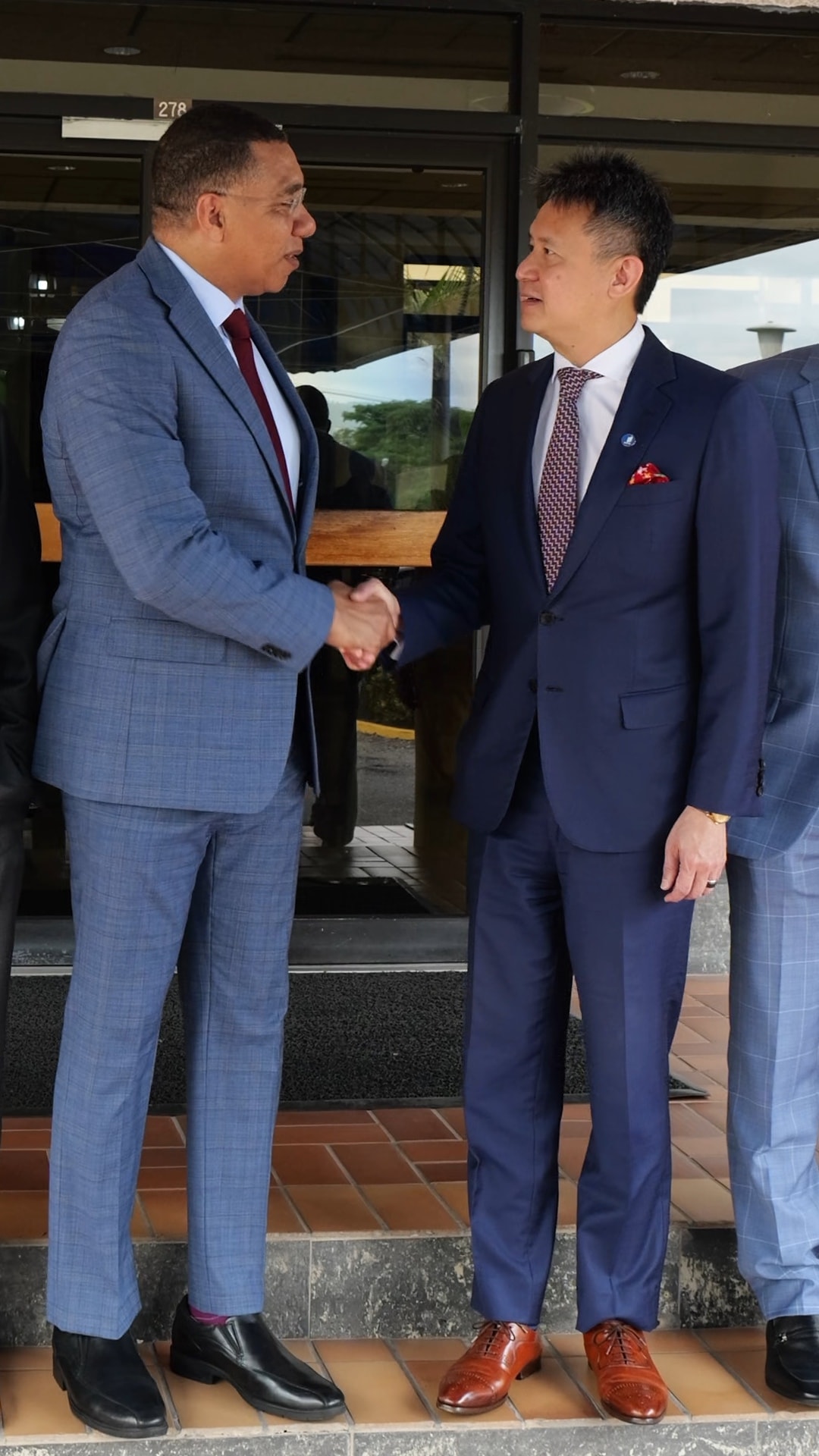 Prime Minister Andrew Holness greets WIPO Director General Daren Tang during his official visit to Jamaica.